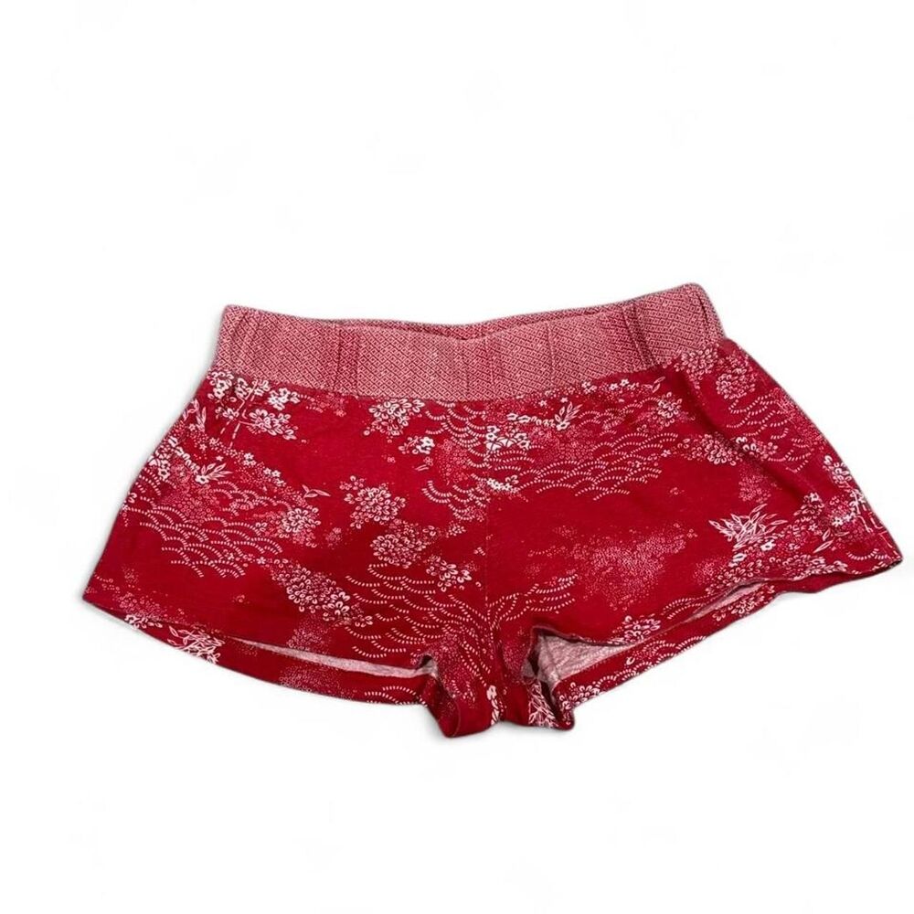 Red mini shorts with white floral pattern